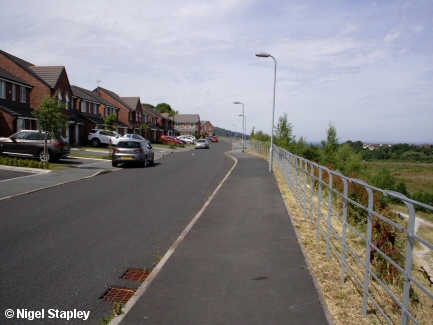 Picture of new houses along the edge of a slope