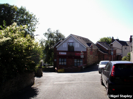 Photo of a building on a junction