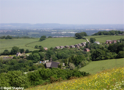 Picture of a church and some houses beyond it
