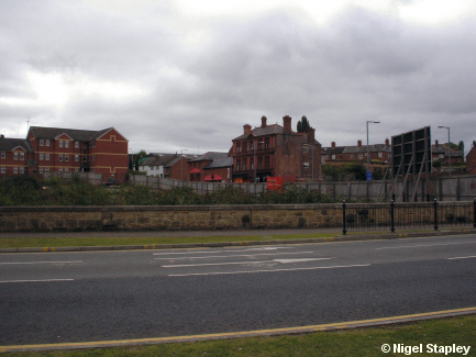 Picture of a derelict open site in a town