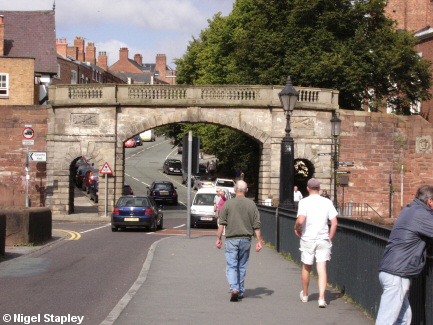Picture of a wall crossing over a street