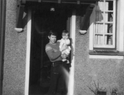 Picture of baby in a teenager's arms