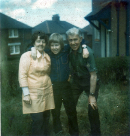 Photo of a woman, a boy and a man