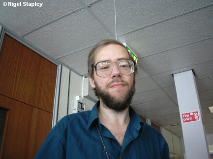 Picture of a man standing in an office