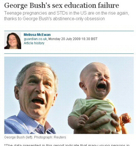 Picture of George W Bush with a baby. The caption reads 'George Bush (left)'