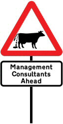 Road sign showing a bull shitting with the legend  'Management Consultants Ahead'