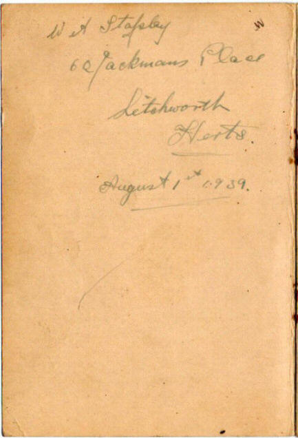 Inside front leaf of a notebook with a name and address