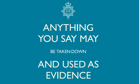 Police poster saying 'Anything you say may be taken down and used as evidence'