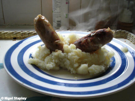 Photo of a plate of sausage and mash