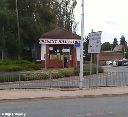 Shop front bearing the name 'Cresent Hill Stores