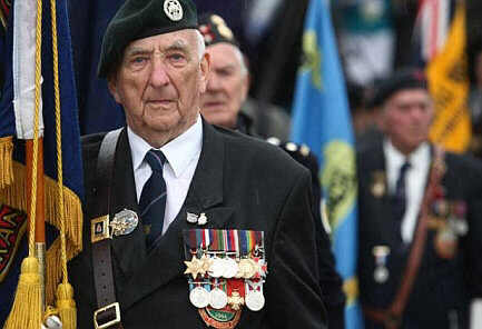 Photo of a D-Day veteran at a commemorative parade
