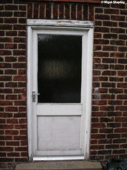 Picture of a grotty old back door - outside