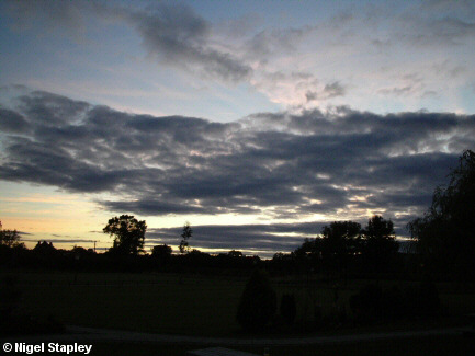 A photo of dusk at the Holt Lodge Hotel