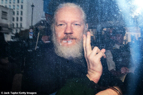 Photo of Julian Assange in a prison van
