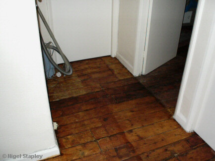 Photo of stained floorboards