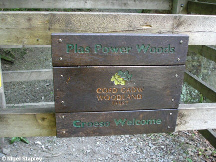 Photo of a Woodland Trust plaque on tha gate at Nant Mill