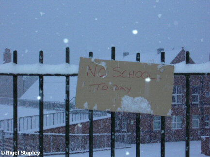 Sign on school gate saying 'No School To-day'