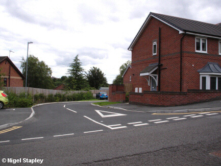 Photo of the entrance to a small housing estate