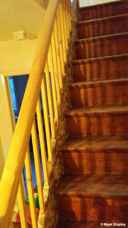 Photo of fully-sanded spindles on a banister