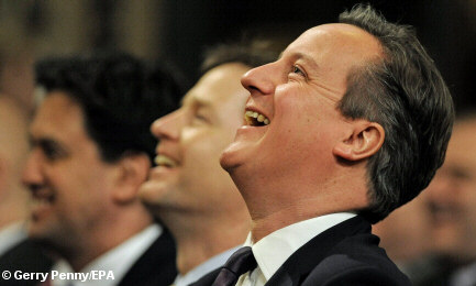 Photo of Milliband, Clegg and Cameron sitting side-by-side and laughing