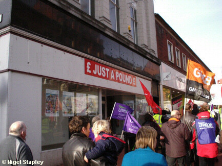 Photo of a shop sign saying 'Just A Pound'